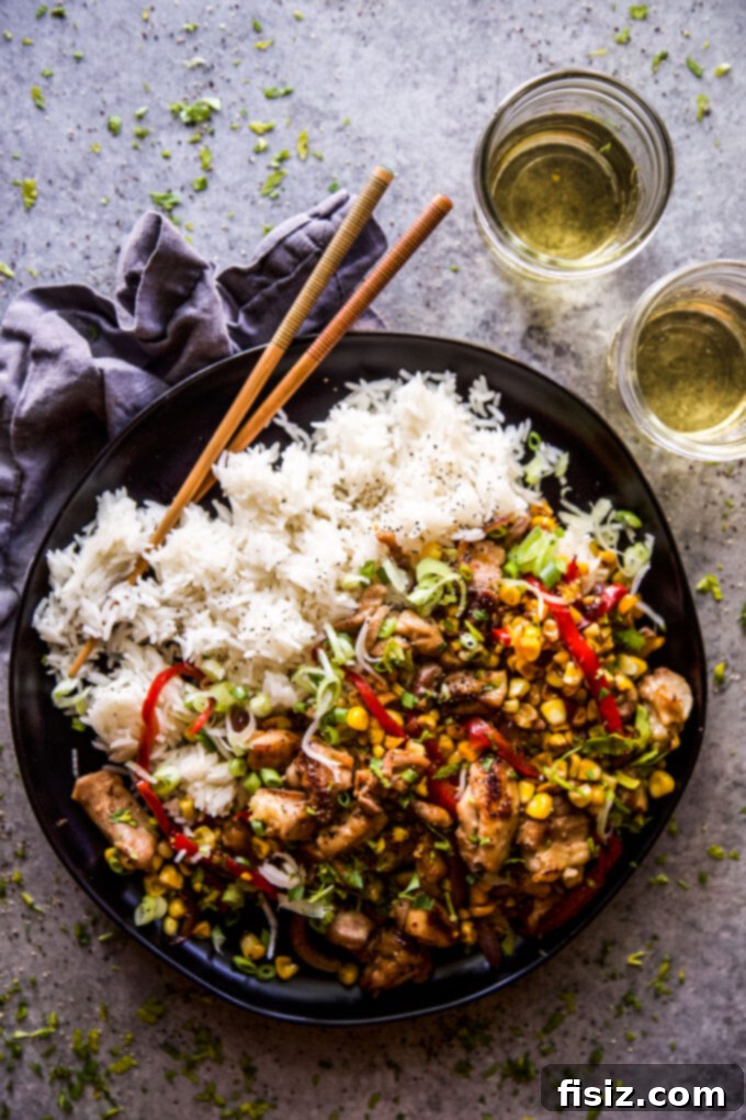 Speedy and Savory Chicken Corn Stir-Fry 7 Beautifully plated Easy Chicken & Corn Stir-Fry, garnished with fresh herbs and ready to be served