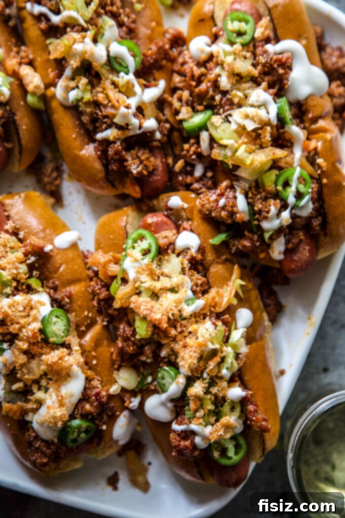 Beautifully plated Loaded Chorizo & Kimchi Hot Dogs, ready to be enjoyed
