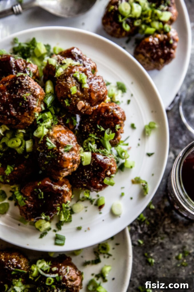Caramelized Apple Beef Meatballs 6 Serving dish filled with Apple Glazed Beef Meatballs, perfectly coated in the savory-sweet glaze and ready to be enjoyed.