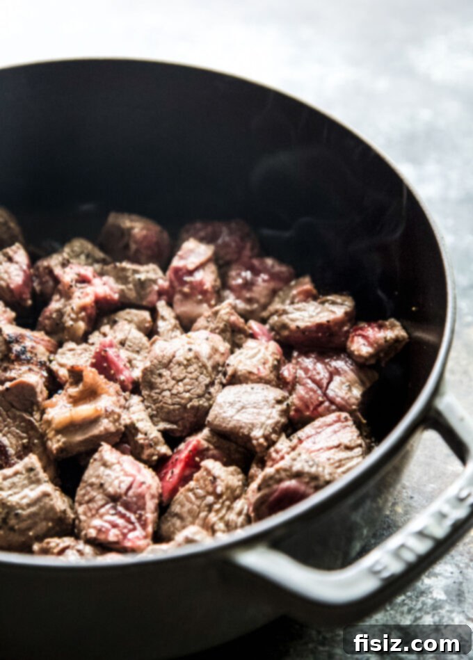 Hearty Beef and Bean Pumpkin Stew 5 beef stew meat in a large pot