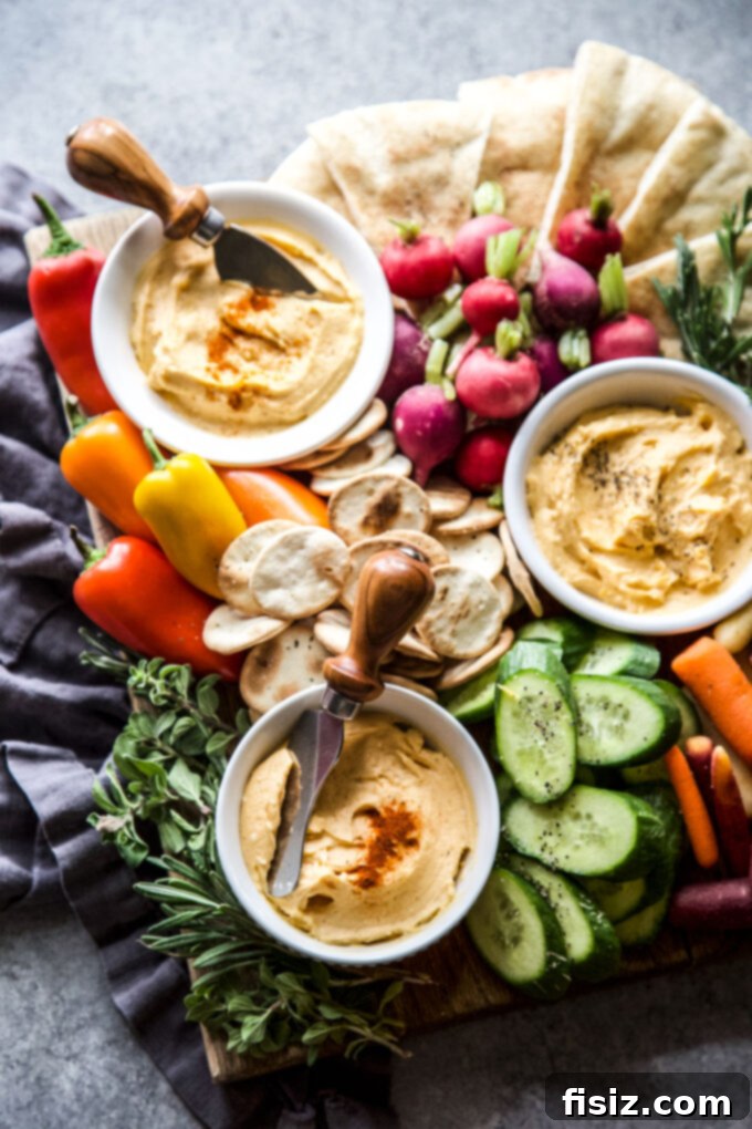 Hearthside Cheese Comfort 5 Fireside Cheese Dip in a serving bowl with a variety of crackers, ready for guests.