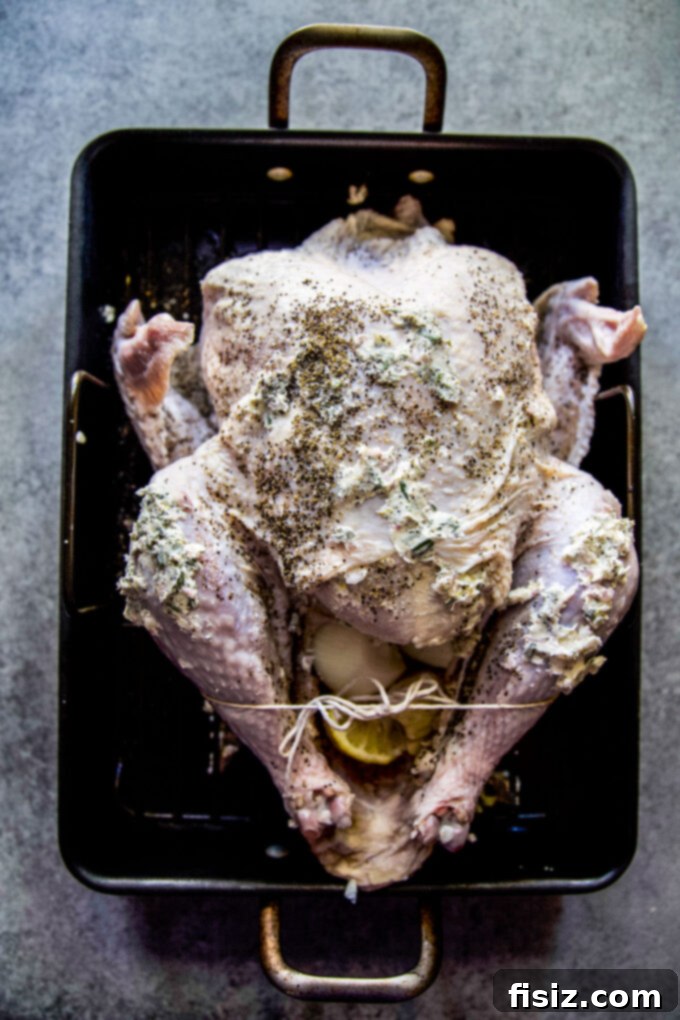 Zesty Herb Butter Roasted Turkey 4 Ingredients for Herb Citrus Butter Roasted Turkey laid out on a table.