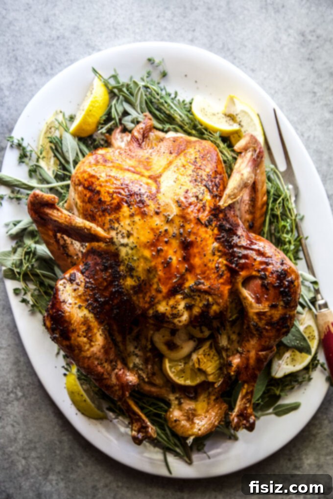 Zesty Herb Butter Roasted Turkey 8 A festive Thanksgiving table setting with roasted turkey.