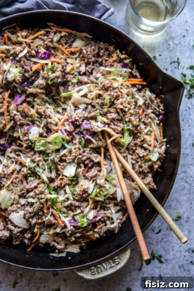 Easy One-Pan Egg Roll Skillet 3 Close-up of Unstuffed Egg Roll Skillet, showing beef, cabbage, and quinoa