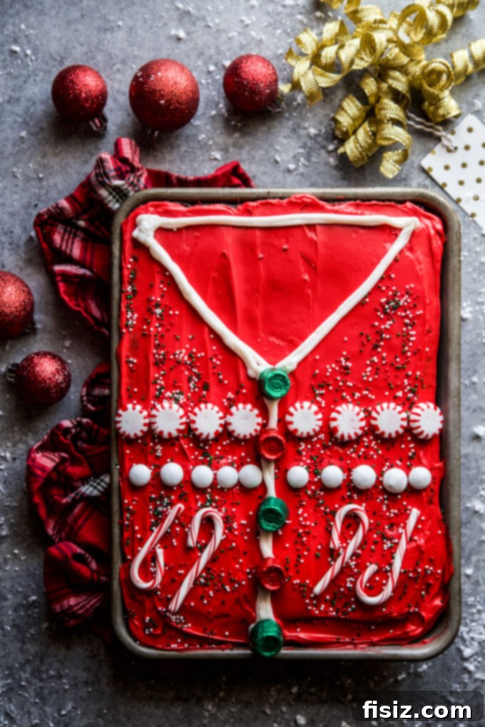 Ugly Sweater Chocolate Cake Extravaganza 2 Ultimate Ugly Sweater Chocolate Cake, decorated with festive candies and sprinkles, ready for a holiday party.