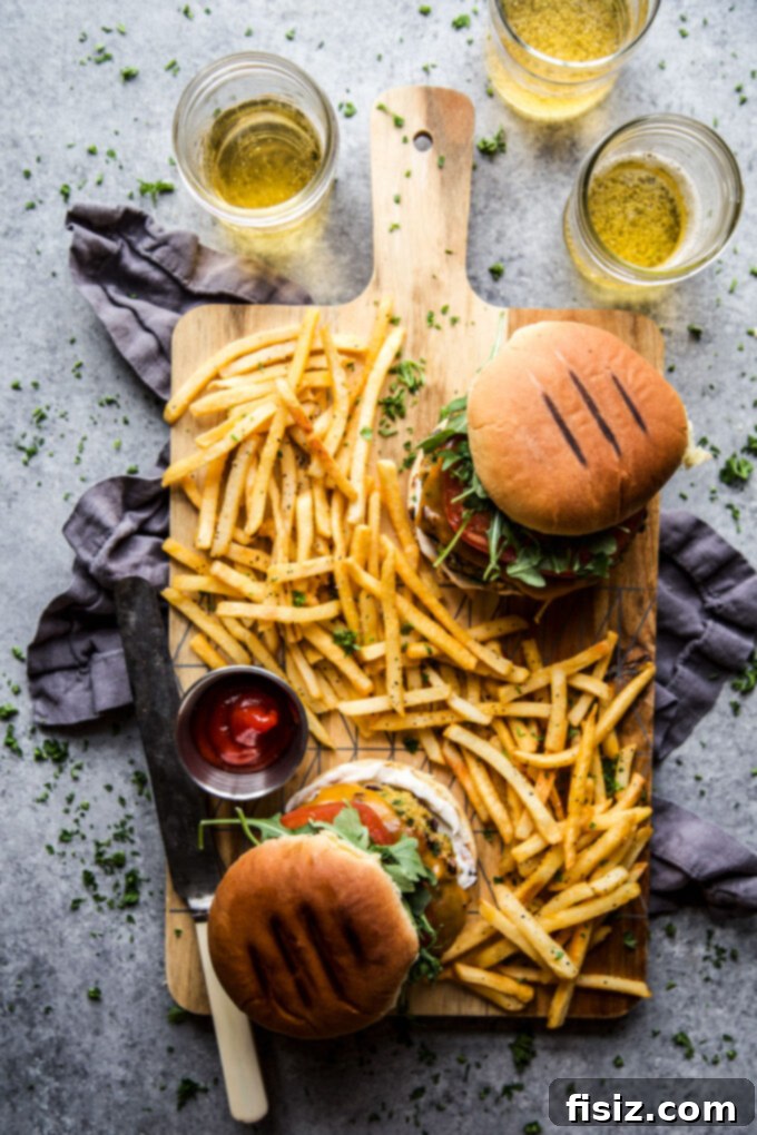 Aromatic Curry Plant-Based Burger 3 Close-up of two golden-brown curry veggie burger patties
