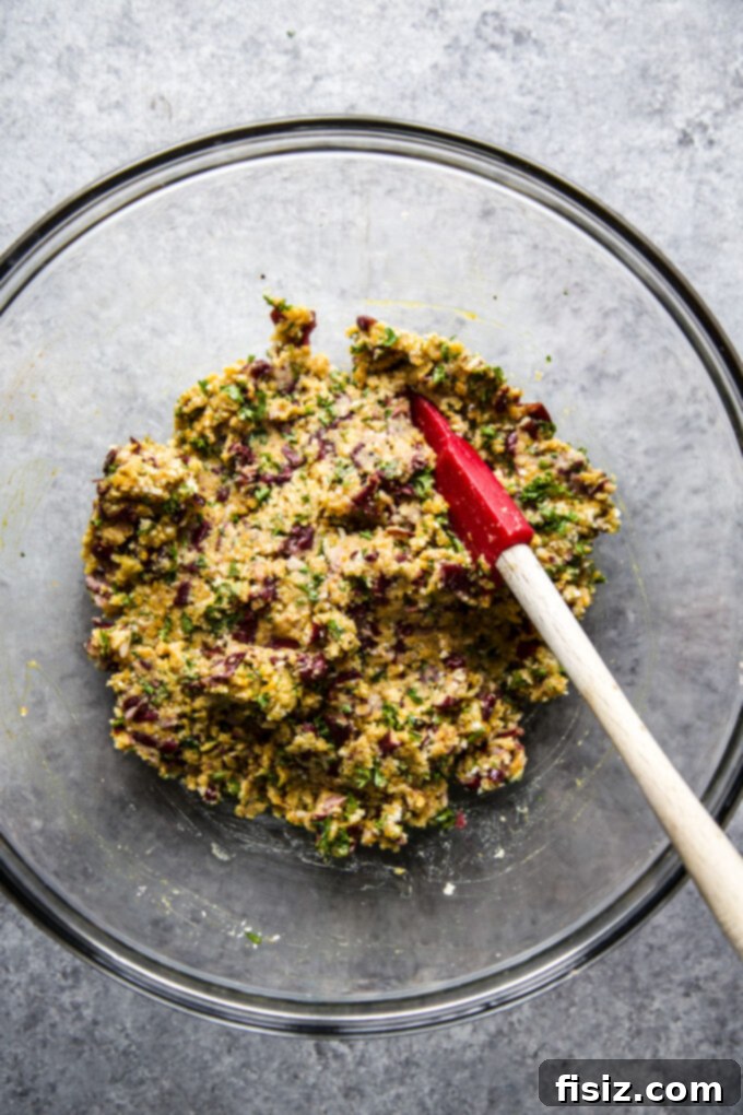 Aromatic Curry Plant-Based Burger 8 Mixing all ingredients for the curry veggie burger patties in a bowl