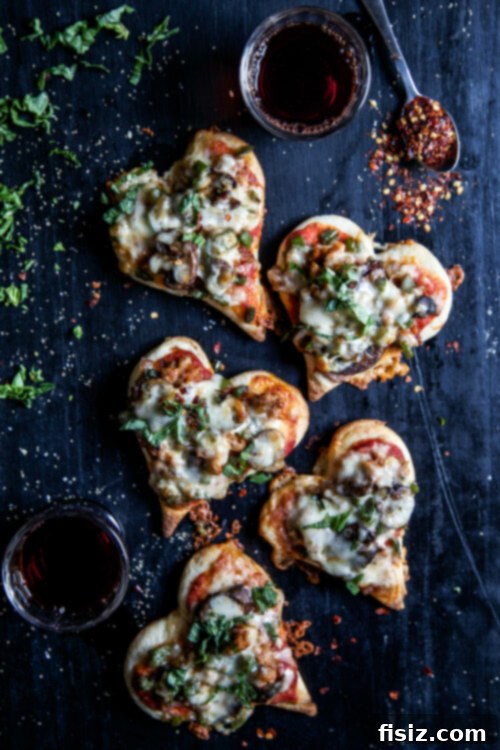 Whip Up Romance: Effortless Valentine's Dinner at Home 3 Mini-Heart-Shaped-Supreme-Pizzas
