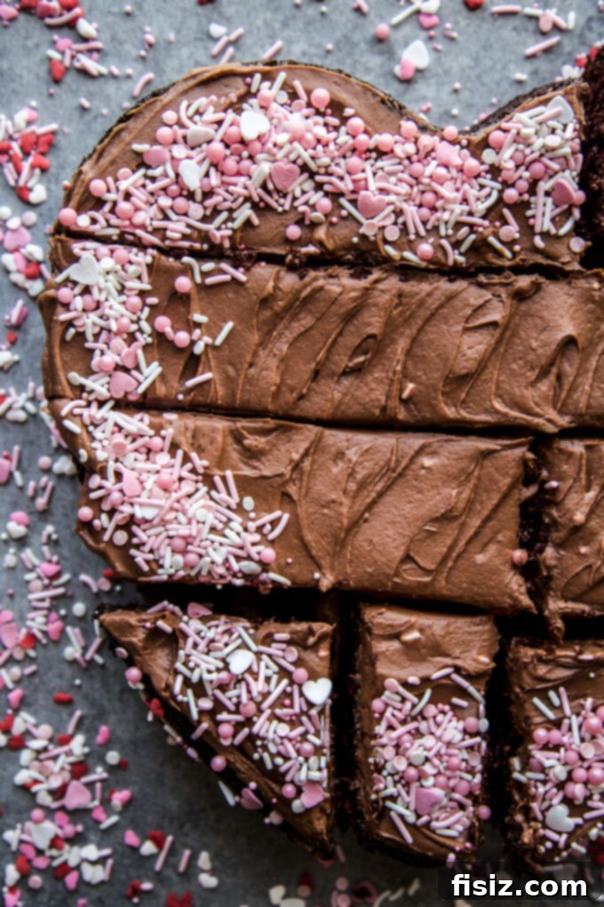 Rich Heart-Shaped Chocolate Cake with Decadent Chocolate Cream Cheese Frosting 3 Close-up of Heart-Shaped Chocolate Cake with Frosting and Sprinkles