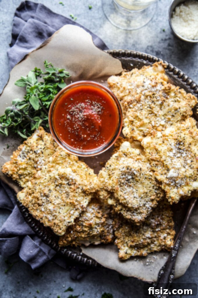 Air Fryer Four Cheese Ravioli Made Easy 3 Crispy Air Fryer Four Cheese Ravioli ready to be served
