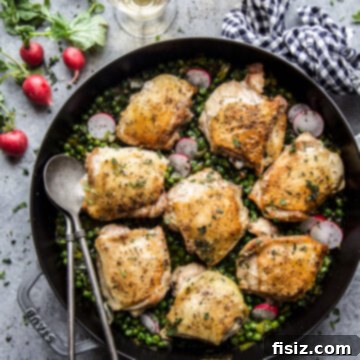 Spring-Inspired Chicken Thighs with Mint and Peas 8 Roasted Chicken Thighs with Peas & Mint - A top-down view of the prepared dish.