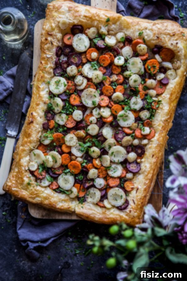 Caramelized Carrot Tart with Fresh Dill – An elegant and flavorful tart, showcasing the natural sweetness of caramelized carrots enhanced by fresh dill.