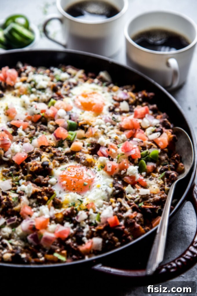 Savory Ground Lamb Huevos Rancheros Skillet 3 Skillet Huevos Rancheros with Ground Lamb www.thecuriousplate.com