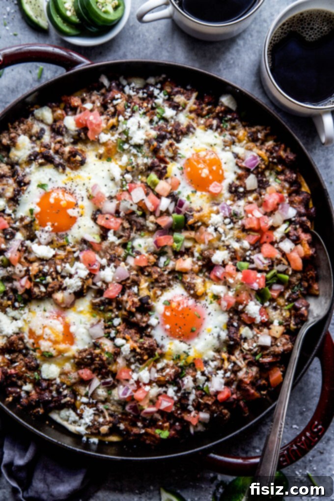 Savory Ground Lamb Huevos Rancheros Skillet 8 Skillet Huevos Rancheros with Ground Lamb www.thecuriousplate.com