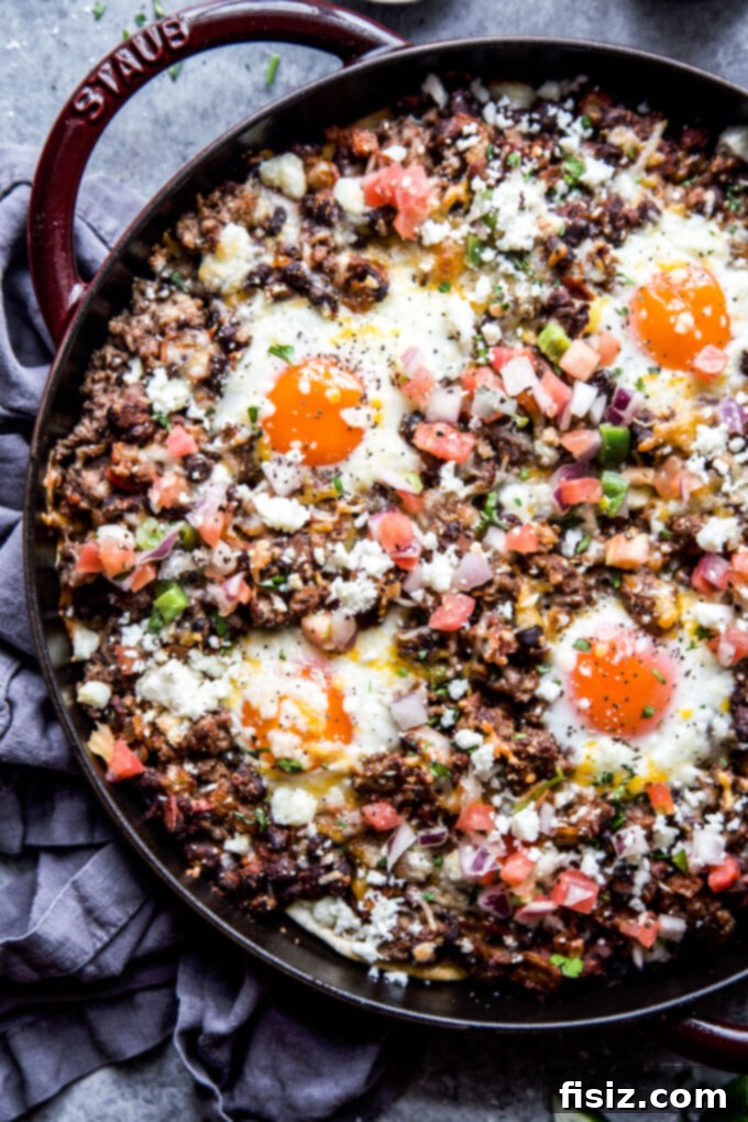Savory Ground Lamb Huevos Rancheros Skillet 9 Skillet Huevos Rancheros with Ground Lamb www.thecuriousplate.com