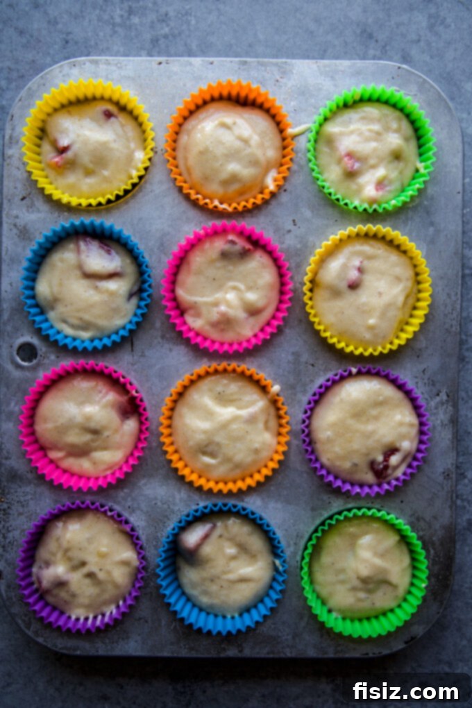 Prepared muffin batter in a bowl, ready for scooping into muffin tins