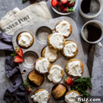 Strawberry Banana Bread Muffins with Vanilla Frosting