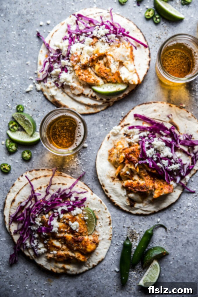 Fish Tacos with a Yucatan Twist 9 Overhead shot of two Yucatan Inspired Fish Tacos on a wooden board