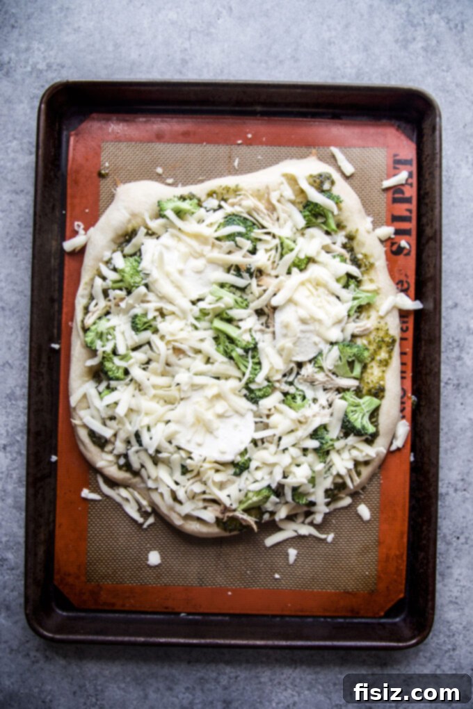 Vibrant Green Goddess Chicken Pizza 7 Green Goddess Chicken Pizza baking in the oven
