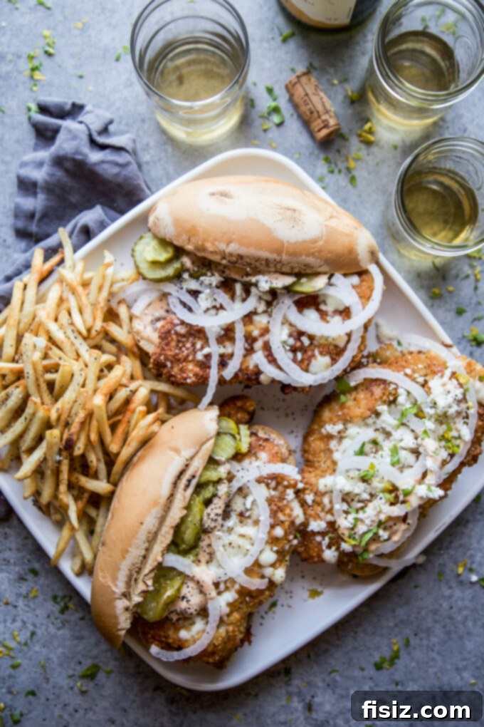 Chipotle Fried Chicken, Queso Fresco Sandwich 2 Chipotle Fried Chicken Sandwich with Queso Fresco, a gourmet twist on a classic with a spicy kick.