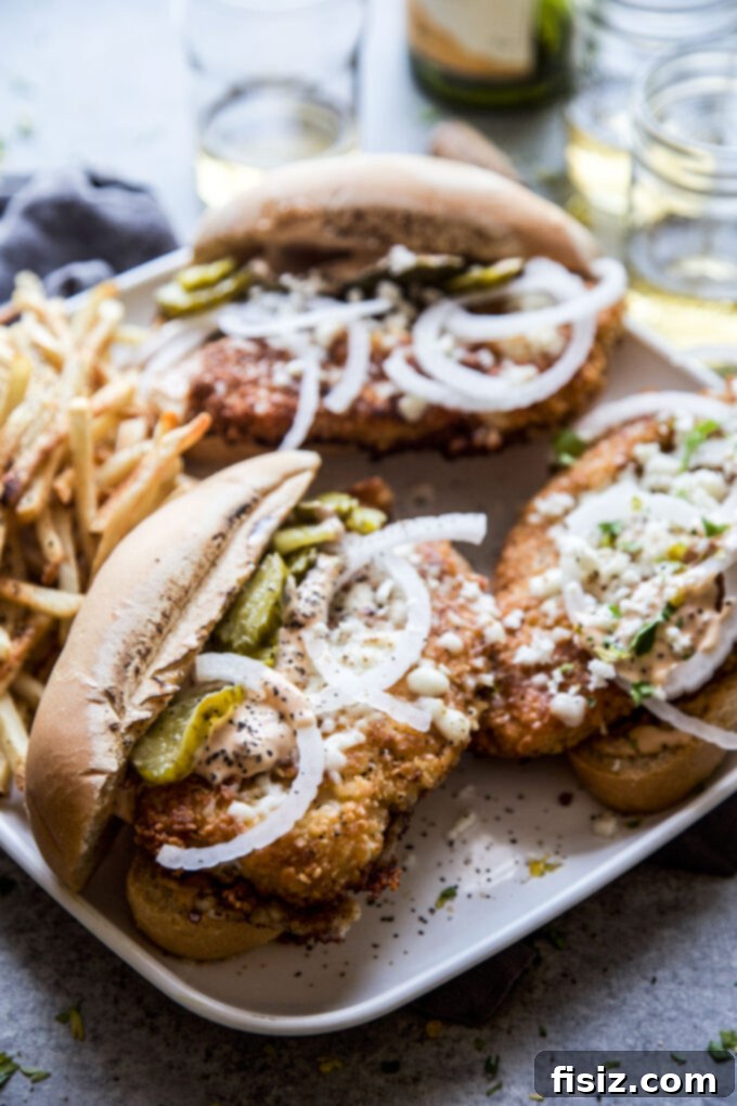Chipotle Fried Chicken, Queso Fresco Sandwich 3 Crispy Chipotle Fried Chicken Sandwich showcasing the golden-brown chicken and fresh toppings.