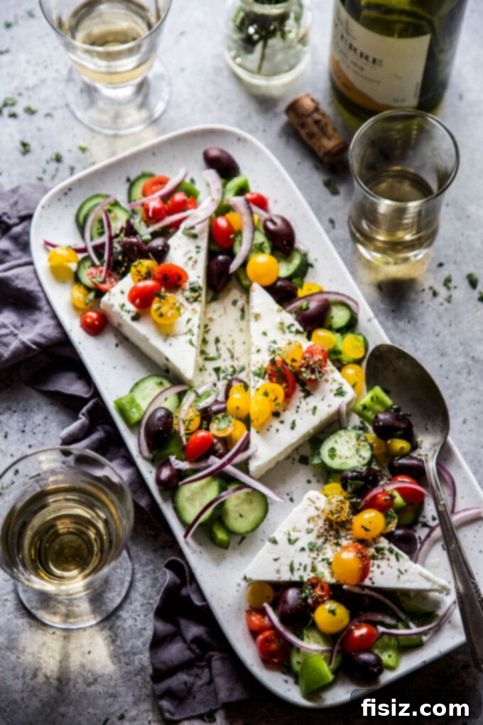 Fresh 15-Minute Greek Feta Salad 3 Close-up of fresh 15-Minute Greek Feta Salad with juicy tomatoes, cucumbers, and bell peppers
