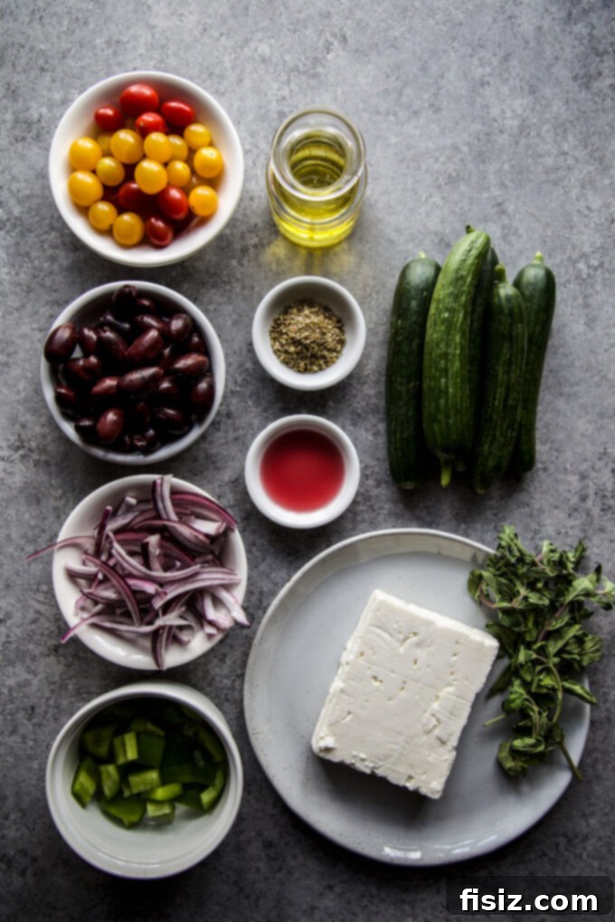 Fresh 15-Minute Greek Feta Salad 4 Fresh ingredients for Greek Feta Salad: block feta, bell pepper, olives, tomatoes, cucumbers, red onion, olive oil, and oregano