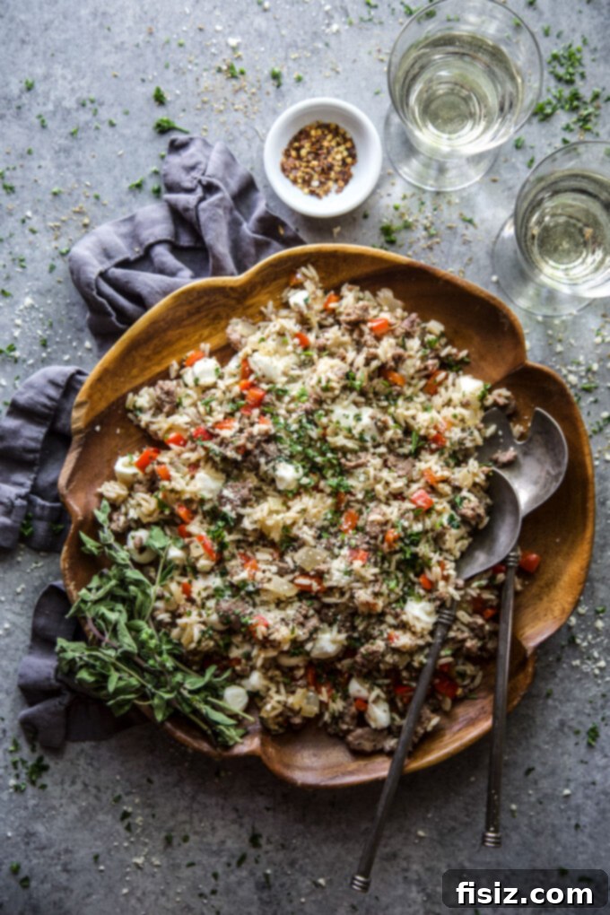 Quick Tuscan Fried Rice 10 A final, vibrant serving of Easy Tuscan Fried Rice in a bowl, garnished with fresh herbs.