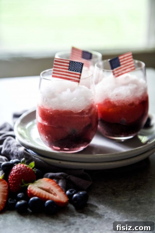 49 Easy Ideas for Your Fourth of July Feast 5 Patriotic Layered Lemonades - A festive and refreshing drink for Independence Day.