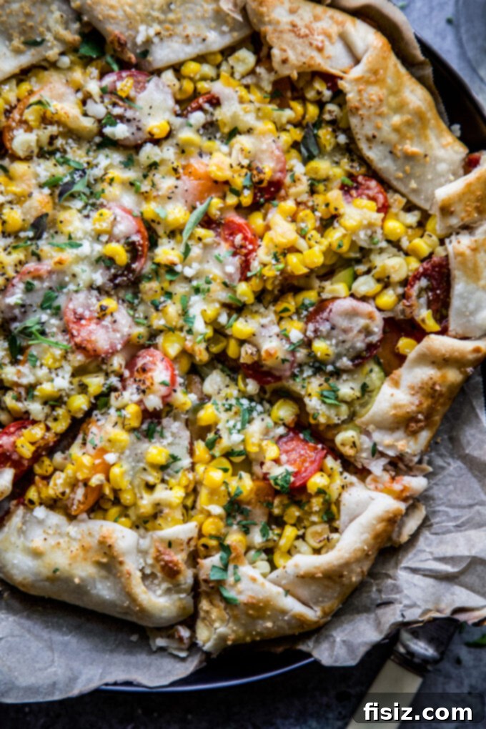 Savory Garden Parmesan Tart 3 Close-up of a Garden Veggie Parmesan Tart, showcasing the golden, bubbling cheese and perfectly cooked colorful vegetables, a delicious and healthy vegetarian meal.