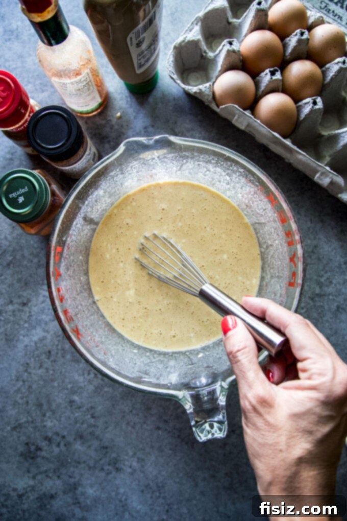 Hearty Tex Mex Morning Bake 7 Ingredients for Tex-Mex Egg & Hash Brown Casserole on a wooden board