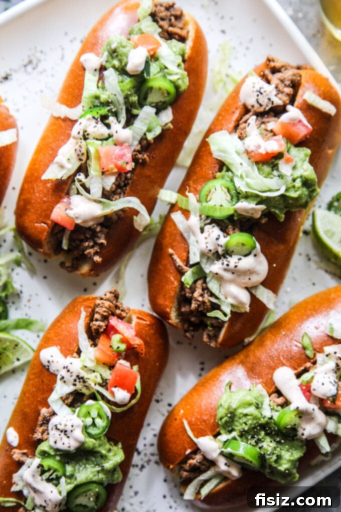 Adobo-Loaded Taco Subs 3 Taco-Stuffed Subs with Adobo Sauce www.thecuriousplate.com