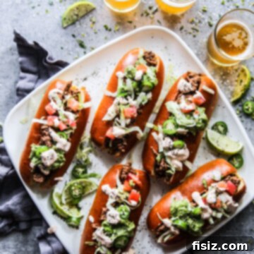 Adobo-Loaded Taco Subs 8 Taco-Stuffed Subs with Adobo Sauce www.thecuriousplate.com