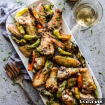 Tangy Lemon-Garlic Wings & Charred Shishitos 9 lemon garlic grilled chicken wings with shishito peppers