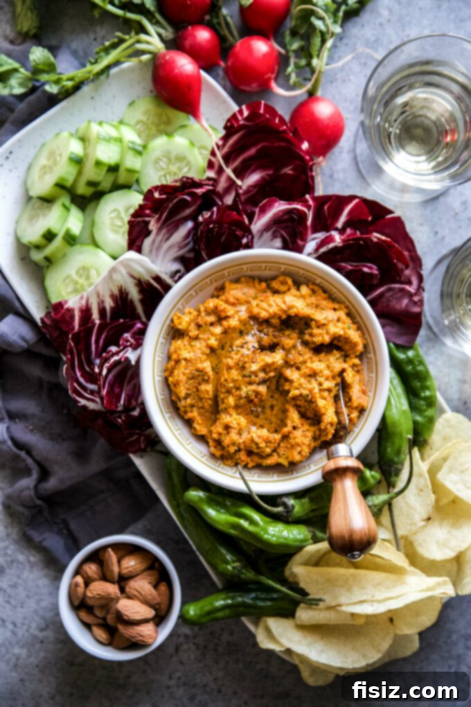 Our Top 30 Cozy Fall Recipes 3 Easy Smoky Carrot Dip, a healthy and flavorful fall appetizer, served with fresh vegetables.