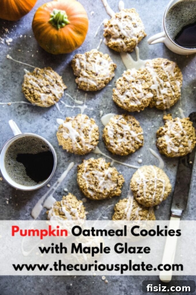 Warm Maple Drizzled Pumpkin Oat Cookies 12 Beautifully presented Pumpkin Oatmeal Cookies with Maple Glaze on a serving plate