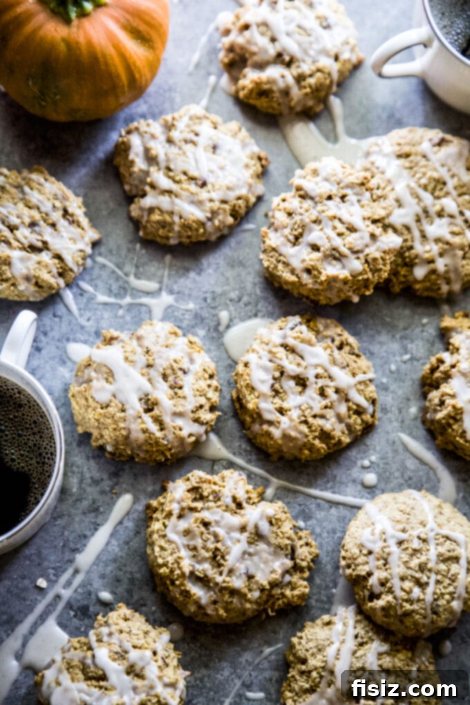 Warm Maple Drizzled Pumpkin Oat Cookies 10 Stack of Pumpkin Oatmeal Cookies with Maple Glaze, ready to be enjoyed