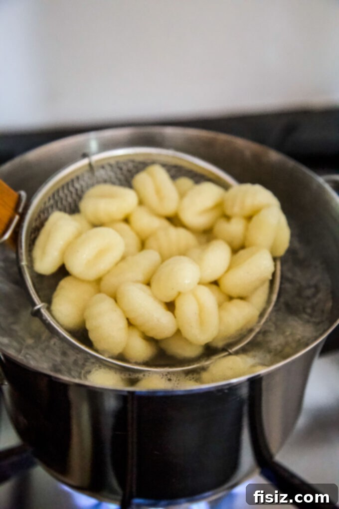Cozy Pumpkin Gnocchi Skillet Bake 6 Gnocchi cooking in boiling water
