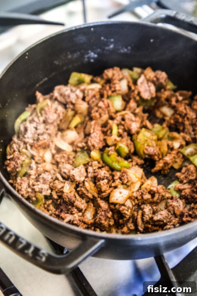 Loaded Cheesy Chili Peppers 4 ground beef chili in a pot