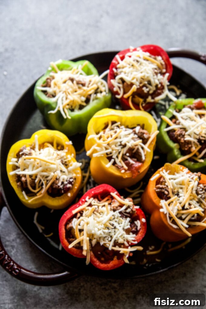 Loaded Cheesy Chili Peppers 5 easy chili cheese stuffed peppers www.thecuriousplate.com.