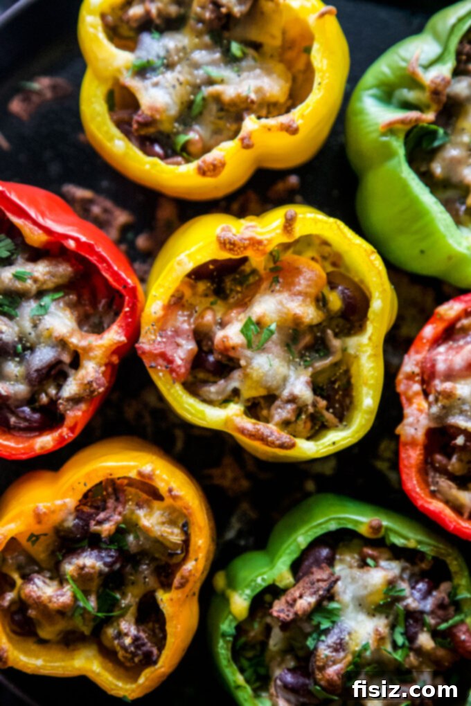 Cheesy Chili Stuffed Peppers 6 easy chili cheese stuffed peppers with various fresh toppings like sour cream and herbs