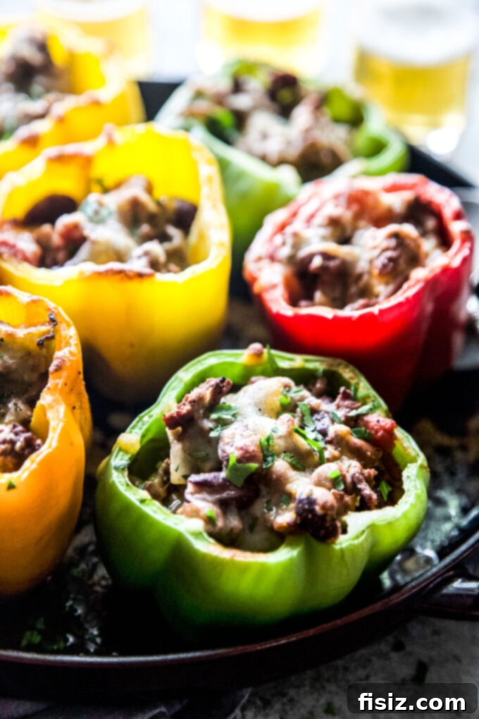 Cheesy Chili Stuffed Peppers 7 a close-up of a single easy chili cheese stuffed pepper, ready to be served