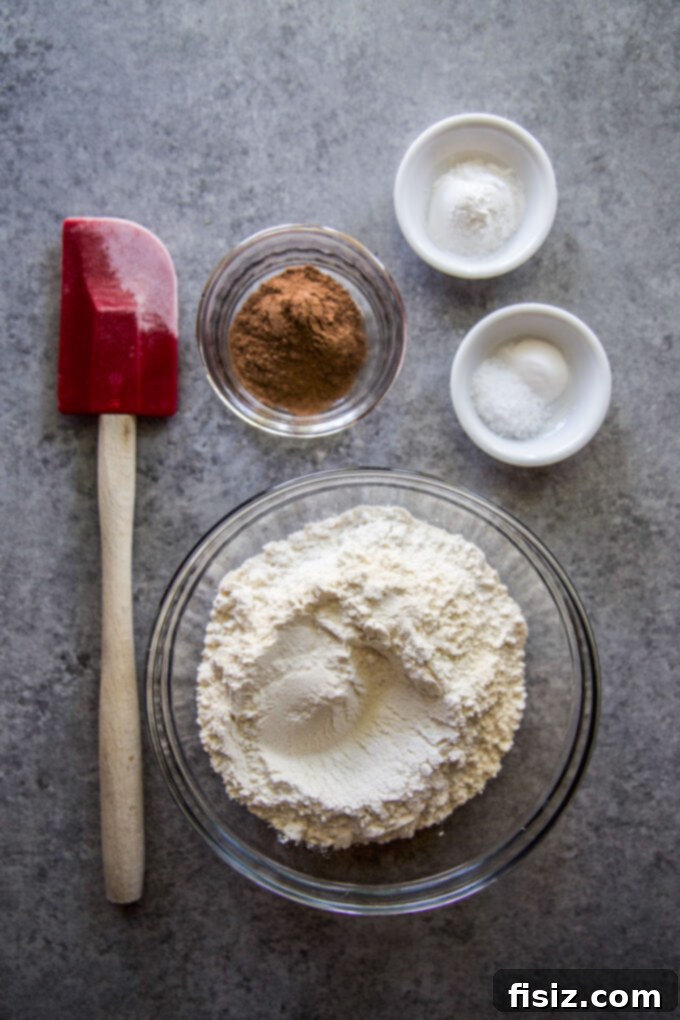 Maple Kissed Baked Pumpkin Doughnuts 4 Dry ingredients for baked pumpkin doughnuts in a bowl