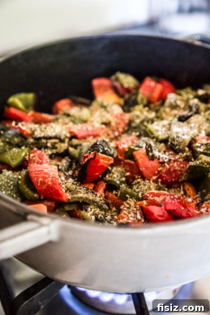 Charred Tomato Poblano Bisque 7 soup simmering on the stove