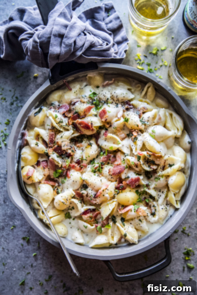 Wickedly Easy Halloween Bites 4 A hearty serving of Stovetop Hard Cider Mac and Cheese with Crispy Bacon, a perfect comforting side for an easy Halloween meal.