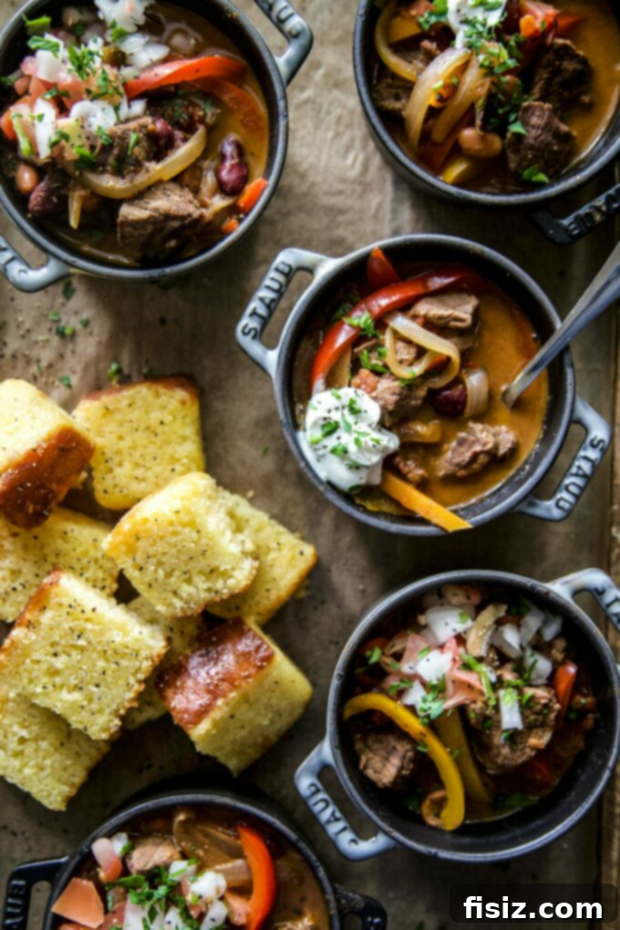 Wickedly Easy Halloween Bites 5 A steaming bowl of Steak Fajita Chili, a hearty and easy Halloween recipe perfect for a main course.