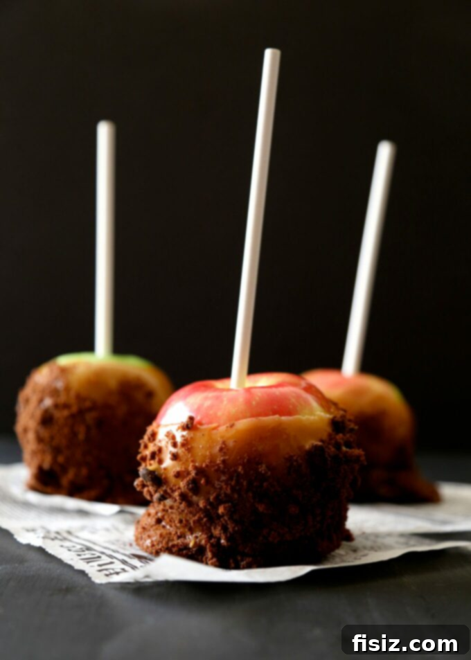 Wickedly Easy Halloween Bites 6 Delicious Easy Bourbon Caramel Apples with Chocolate Chip Brownie Brittle, a perfect and easy Halloween dessert.