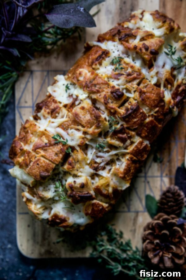 Whip Up These 27 Pumpkin Recipes Today 4 Warm and savory Three Cheese Pumpkin Pull-Apart Bread, ideal for sharing as an appetizer.