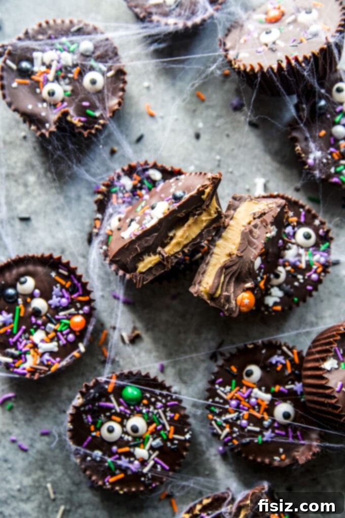 Wicked Good Halloween Dark Chocolate Peanut Butter Cups 2 Decadent Homemade Dark Chocolate Peanut Butter Cups, perfectly crafted for Halloween. A delightful no-bake treat from The Curious Plate.