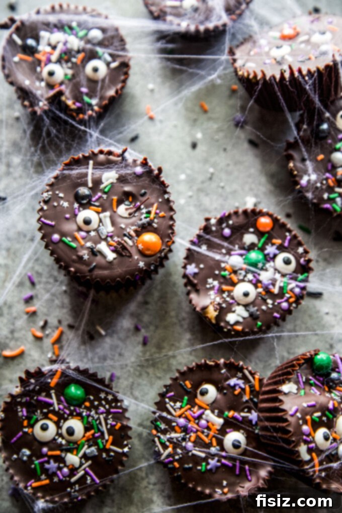 Wicked Good Halloween Dark Chocolate Peanut Butter Cups 9 An inviting bowl of Homemade Dark Chocolate Peanut Butter Cups, perfect for sharing at Halloween gatherings.